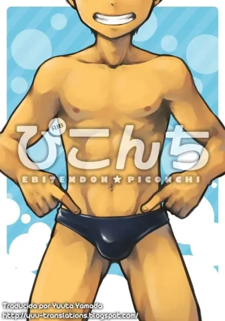Piconchi Torakichi musculoso con slip negro ajustado marcando su bulto genital mientras señala su entrepierna.