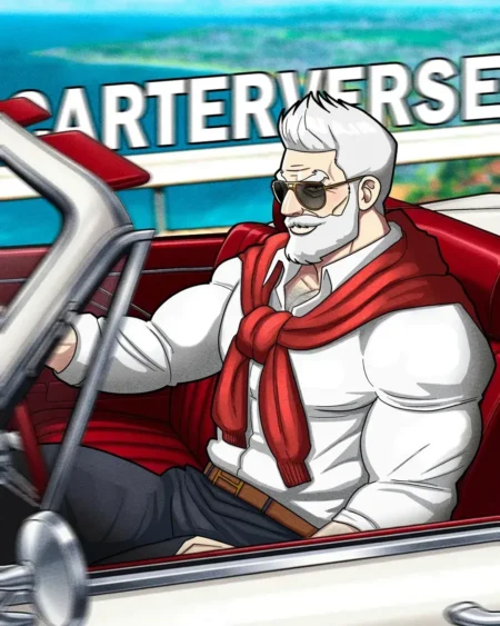Hombre musculoso con barba blanca y gafas oscuras sentado en un descapotable rojo vistiendo camisa blanca y suéter rojo.